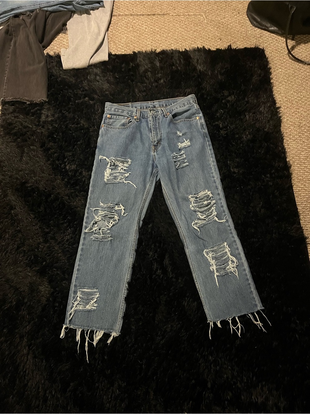 Distressed Light Blue Straight-Leg Jeans